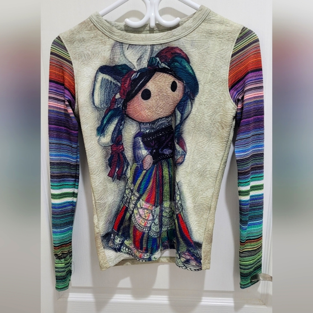 Colorful top with Mexican doll